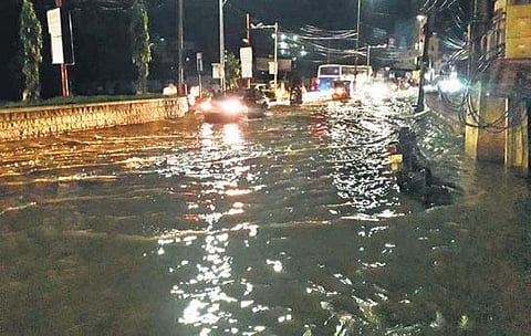 A waterlogged road in Tirupati on Wednesday after a downpour. (Photo | Madhav K)