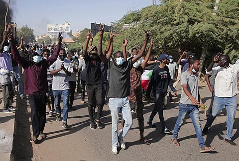 Sudanese protest against the military takeover, which upended the country’s fragile transition to democracy, in Khartoum, Sudan (Photo | AP)