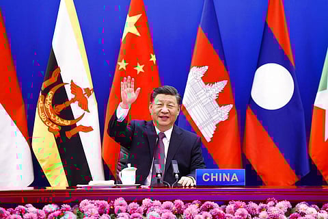 Chinese President Xi Jinping waves as he chairs the ASEAN-China Special Summit to commemorate the 30th Anniversary of ASEAN-China Dialogue Relations (Photo | AP)