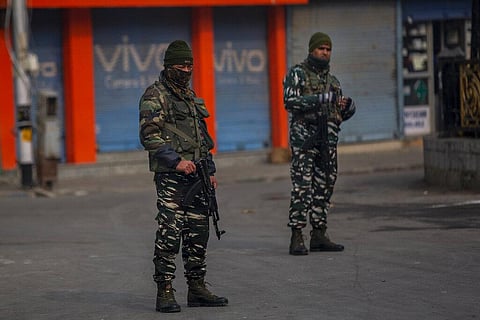 Indian paramilitary soldiers stand guard outside a paramilitary post during a strike called by separatist leaders. (Photo | AP)