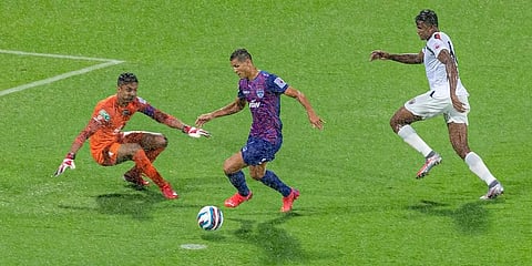 Cleiton Augusto Oliveira Silva of Bengaluru FC attempts to score during ISL match against NorthEast United FC, at GMC Athletic stadium in Goa, Saturday, Nov 20, 2021. (Photo | PTI)