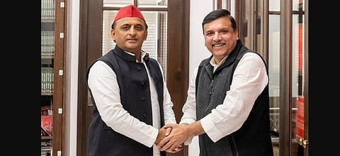 Akhilesh Yadav with UP AAP incharge Sanjay Singh. (Photo | Twitter/ @SanjayAzadSln)