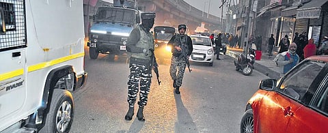 Security personnel near the encounter site in Srinagar’s Rambagh. (Photo | Zahoor Punjabi, EPS)