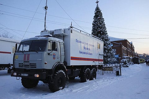 Russian Emergency Ministry truck is parked at the Listvyazhnaya mine, right, near Belovo, in the Kemerovo region of southwestern Siberia (Photo | AP)