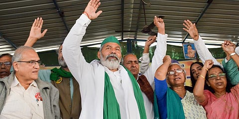BKU leader Rakesh Tikait and activists at Delhi's Ghazipur border. (Photo| PTI)