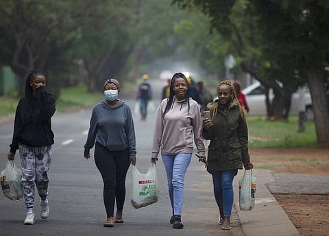 Students from the Tshwane University of Technology make their way back to their residence in Pretoria, South Africa (Photo | AP)