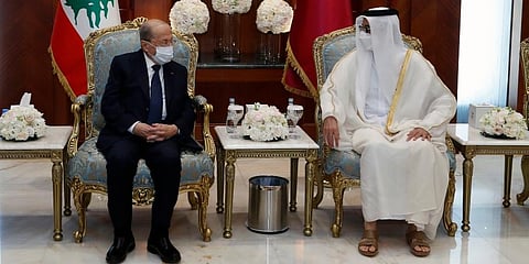 Qatar's Emir Sheikh Tamim bin Hamad Al Thani (R) meets with Lebanese President Michel Aoun, in Doha. (Photo | AP)