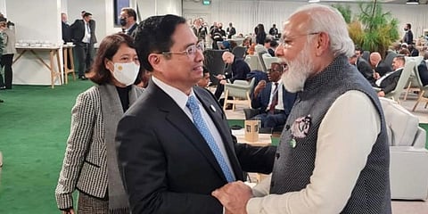 PM Narendra Modi (R) with Vietnam counterpart Pham Minh Chinh. (Photo| Twitter/ @AmbHanoi)