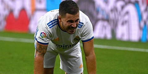 Real Madrid's Belgian forward Eden Hazard reacts after being fouled. (Photo | AFP)
