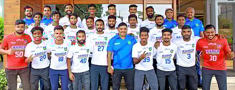 Kerala squad with their head coach Bino George