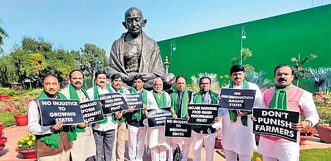 TRS MPs stage a protest outside Parliament in New Delhi on Monday, Nov 29, 2021.