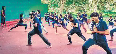 Employees of a Technopark firm being trained in kalari at Golf Club in Thiruvananthapuram as part of rejuvenation ahead of working from office
