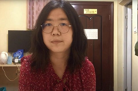 Former Chinese lawyer and citizen journalist Zhang Zhan as she broadcasts via YouTube, at an unconfirmed location in China (Photo | AFP)