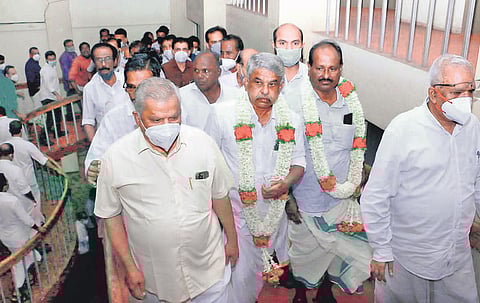 Karayi Rajan and Chandrasekharan being escorted to the Rural Bank auditorium in Kannur where a reception was arranged for them. CPM district secretary M V Jayarajan and state committee member P Jayara