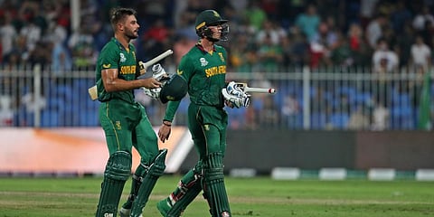 South Africa's Rassie van der Dussen (R) and Aiden Markram leave the field at the end of the innings during the Cricket Twenty20 World Cup match against England. (Photo | AP)
