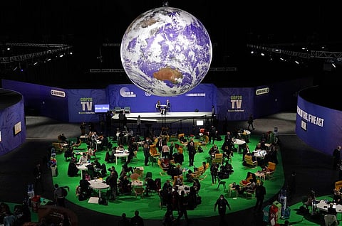 Delegates gather inside the venue on another day at the COP26 U.N. Climate Summit in Glasgow, Scotland (Photo | AP)