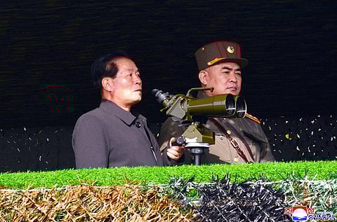 North Korean senior official Pak Jong Chon, left, inspects the army's artillery firing competition (Photo | AP)