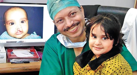 Plastic surgeon Dr Subodh Kumar Singh with his successful patient.
