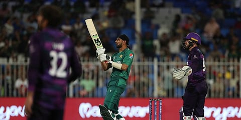 Pakistan's Shoaib Malik, center, watches his shot during the Cricket Twenty20 World Cup match between Pakistan and Scotland in Sharjah, UAE, Sunday, Nov. 7, 2021. (Photo | AP)