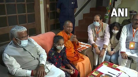 CM Yogi Adityanath meets Kairana residents who returned after the migration in 2016, on Monday (Photo | Twitter/ANI)