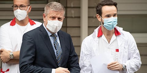 Doctor Peter Sabaka, right, and Slovakia's Health Minister Vladimir Lengvarsky attend a press conference in Bratislava, Slovakia. (Photo | AP)
