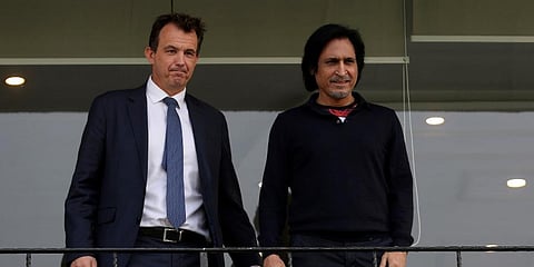 England and Wales Cricket Board's chief executive Tom Harrison, left, stands with Pakistan Cricket Board Chairman Ramiz Raja, right, at Gaddafi Stadium, Lahore. (Photo | PTI)