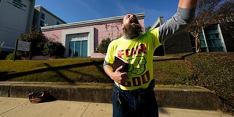 Allen Siders, an anti-abortion activist, preaches outside of the Jackson Women's Health Organization, a state-licensed abortion clinic in Jackson. (Photo | AP)