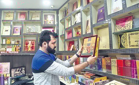 Wedding card shops in Delhi’s Chawri Bazar experience dwindling profits as weddings become intimate affairs. (Photo | Parveen Negi, EPS)