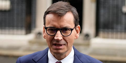 Poland PM Mateusz Morawiecki​ urges COVID vaccinations as deaths rise
