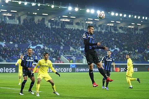 Atalanta's Rafael Toloi, center right, in action during the Champions League group F soccer match between Atalanta and Villarreal in Bergamo (Photo | AP)