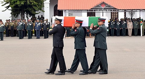 Army personnel carry the mortal remains of the dead in the helicopter crash involving late Chief of Defense Staff, Gen Bipin Rawat. (Photo | U Rakesh Kumar, EPS)