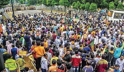 BJP activists taking out a rally from BJP party office to lower PMG over Mamita Meher murder case. (Photo | Express)