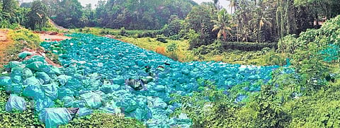 Mounts of biomedical waste dumped inside Thiruvananthapuram Medical College Hospital compound. (Photo | EPS, BP Deepu)