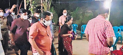 Sreelakshmi, the wife of Air Force Junior Warrant Officer Pradeep A, arriving at their residence at Ponnukkara in Thrissur on Thursday night. Revenue Minister K Rajan was also present when she reached