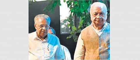 Kerala CM Pinarayi Vijayan, left, with governor Arif Mohammed Khan. (File Photo | Express)