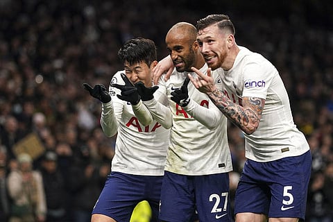 Son Heung-min, left, celebrates scoring his side's third goal during the English Premier League soccer match between Tottenham Hotspur and Norwich City, at Tottenham Hotspur Stadium. (AP)