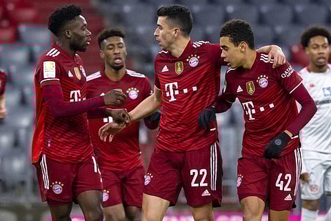 From left. Alphonso Davies, Kingsley Coman, Marc Roca and scorer Jamal Musiala of Munich celebrate their sides second goal during the German Bundesliga soccer match. (Photo | AP)