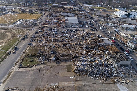 A monstrous tornado killed dozens of people in Kentucky and the toll kept climbing after severe weather ripped through at least five states, leaving widespread devastation. (Photo | AP)