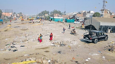 Tents taken down, grounds deserted at Singhu border as farmers started their return journey home. (PTI | Shekhar Yadav)