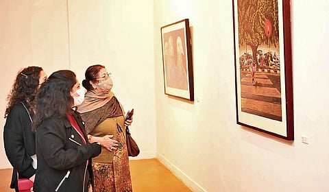 A few viewers at the art exhibition on Tuesday.