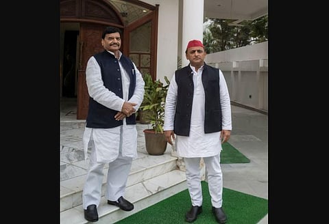 SP chief Akhilesh Yadav with uncle Shivpal Yadav at the latter’s residence in Lucknow on Thursday (Photo | Twitter/@yadavakhilesh)