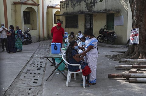 A health worker administers the Covishield vaccine for COVID-19 in Hyderabad. (Photo | AP)