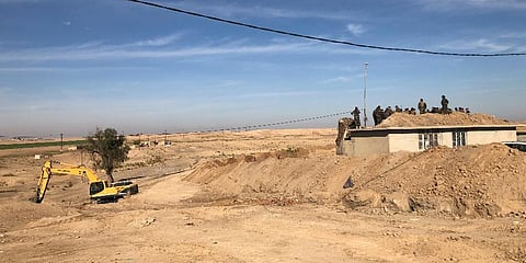 Kurdish Peshmerga forces oversee digging of defensive trenches in the village of Lheiban , Iraq, Tuesday, Dec. 7, 2021. (Photo | AP)