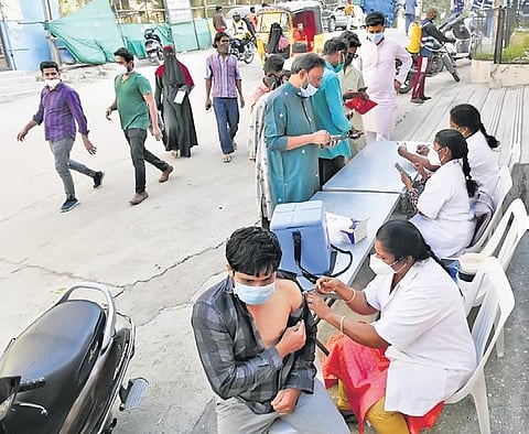 Residents of Paramount Colony in Hyderabad get themselves vaccinated on Friday as fears spike of the Omicron variant of Covid-19 spreading. (Photo | Vinay Madapu)