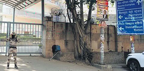 Security personnal alert at the entrance of Rohini district court complex. (Photo| Shekhar Yadav, EPS)