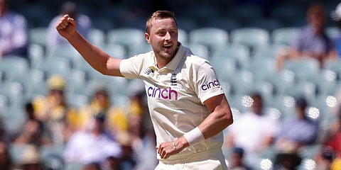 England's Ollie Robinson celebrates taking the wicket of Australia's Steve Smith during the fourth day of their Ashes cricket test match in Adelaide, Australia, Sunday, Dec. 19, 2021. (Photo | AP)