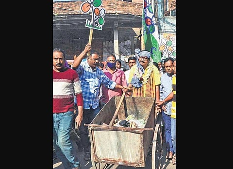 A TMC candidate campaigns for Kolkata civic election. (Photo | PTI)