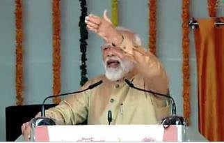 PM Narendra Modi speaking dDuring a programme in UP's Prayagraj. (Photo | EPS)