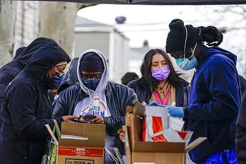 People line up for COVID-19 testing Thursday, Dec. 23, 2021, in the Queens borough of New York. (Photo | AP)