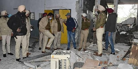 Punjab Police inspect the site of an explosion at the District Court complex, in Ludhiana. (Photo | PTI)